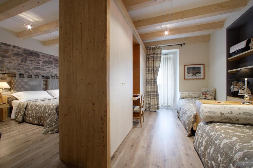 Hotel Savoia Dal 1924 San Martino Di Castrozza Ruang foto